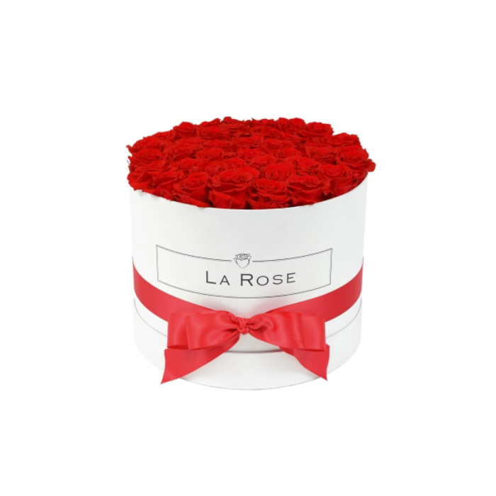 Aranjament floral cu 15 trandafiri parfumati de sapun rosii in cutie rotunda